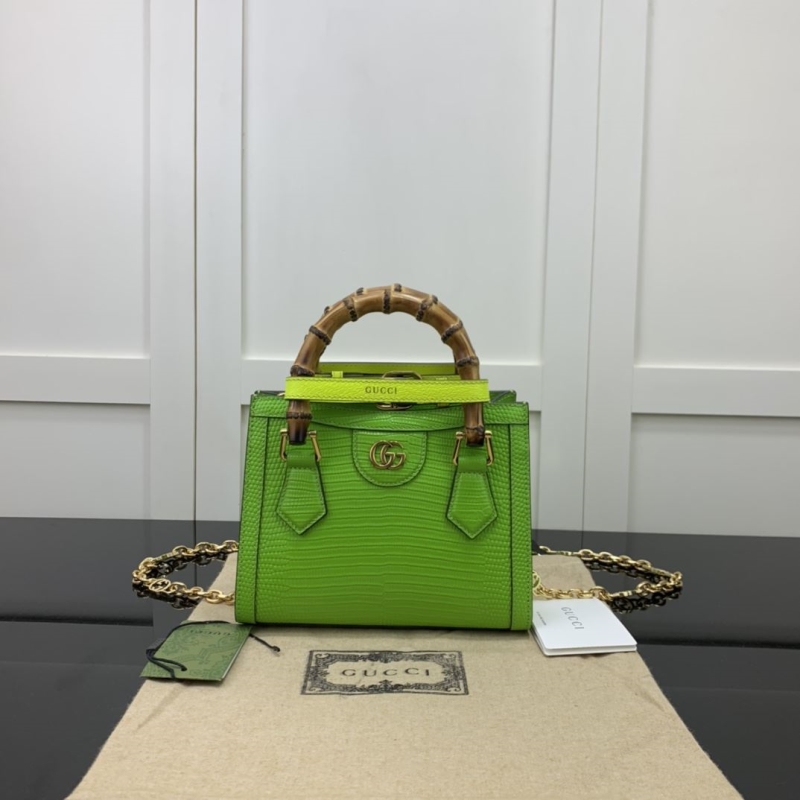 G*u*i top handle bags